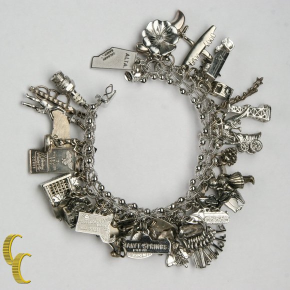 Unique Sterling Silver Charm Bracelet with 35 Charms - Picture 2 of 3